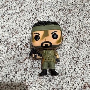 Funko Action Figure with Green and Black Outfit